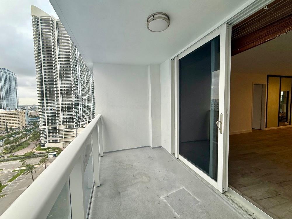 Photo of 1890 Ocean Dr  #1807, Hallandale Beach, Florida, 33009 - Balcony Entrance to Living Room