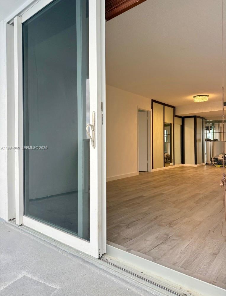 Photo of 1890 Ocean Dr  #1807, Hallandale Beach, Florida, 33009 - Balcony Entrance to Living Room