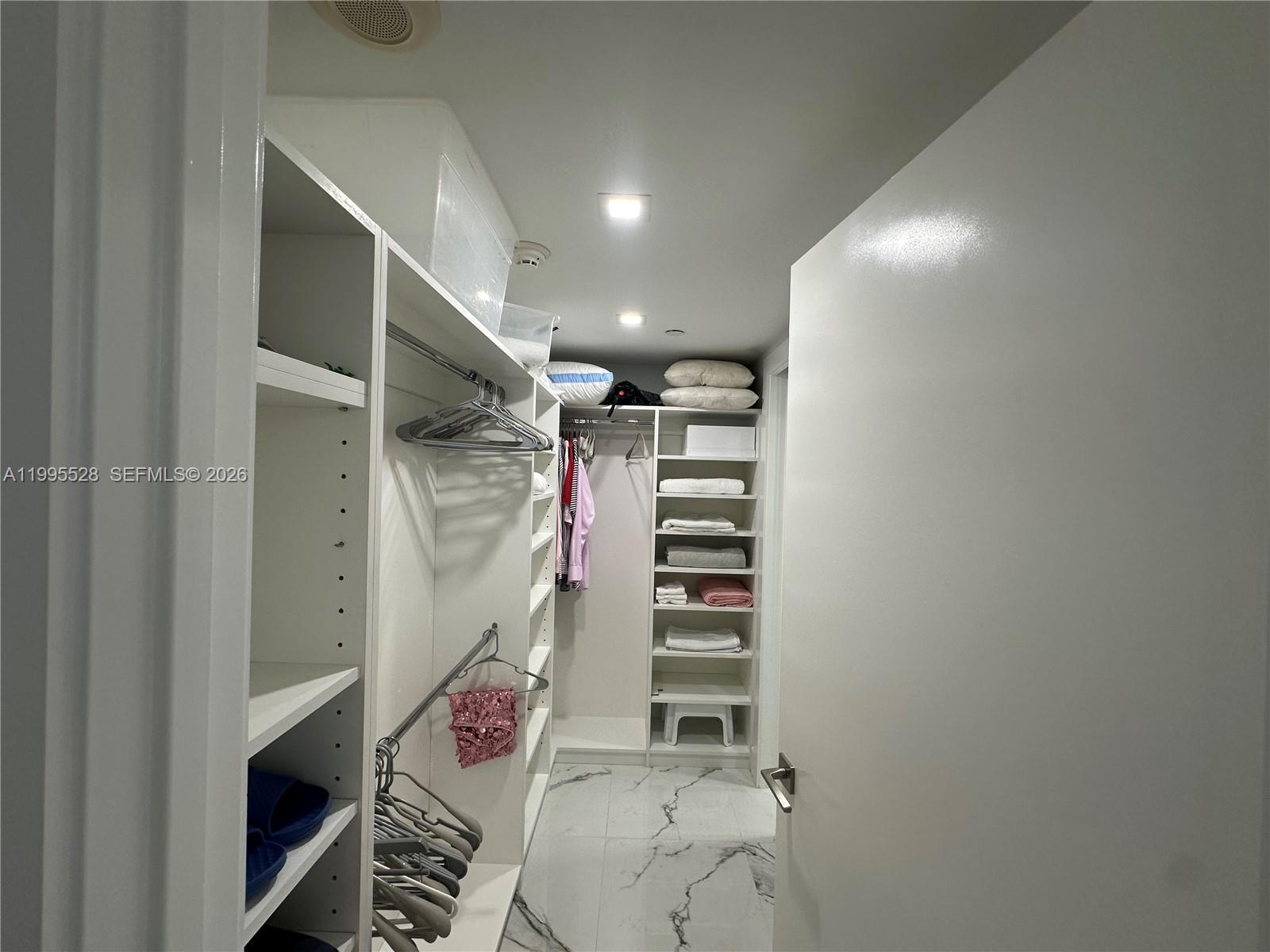 Photo of 19500 Turnberry Way  #14C, Aventura, Florida, 33180 - Master closet