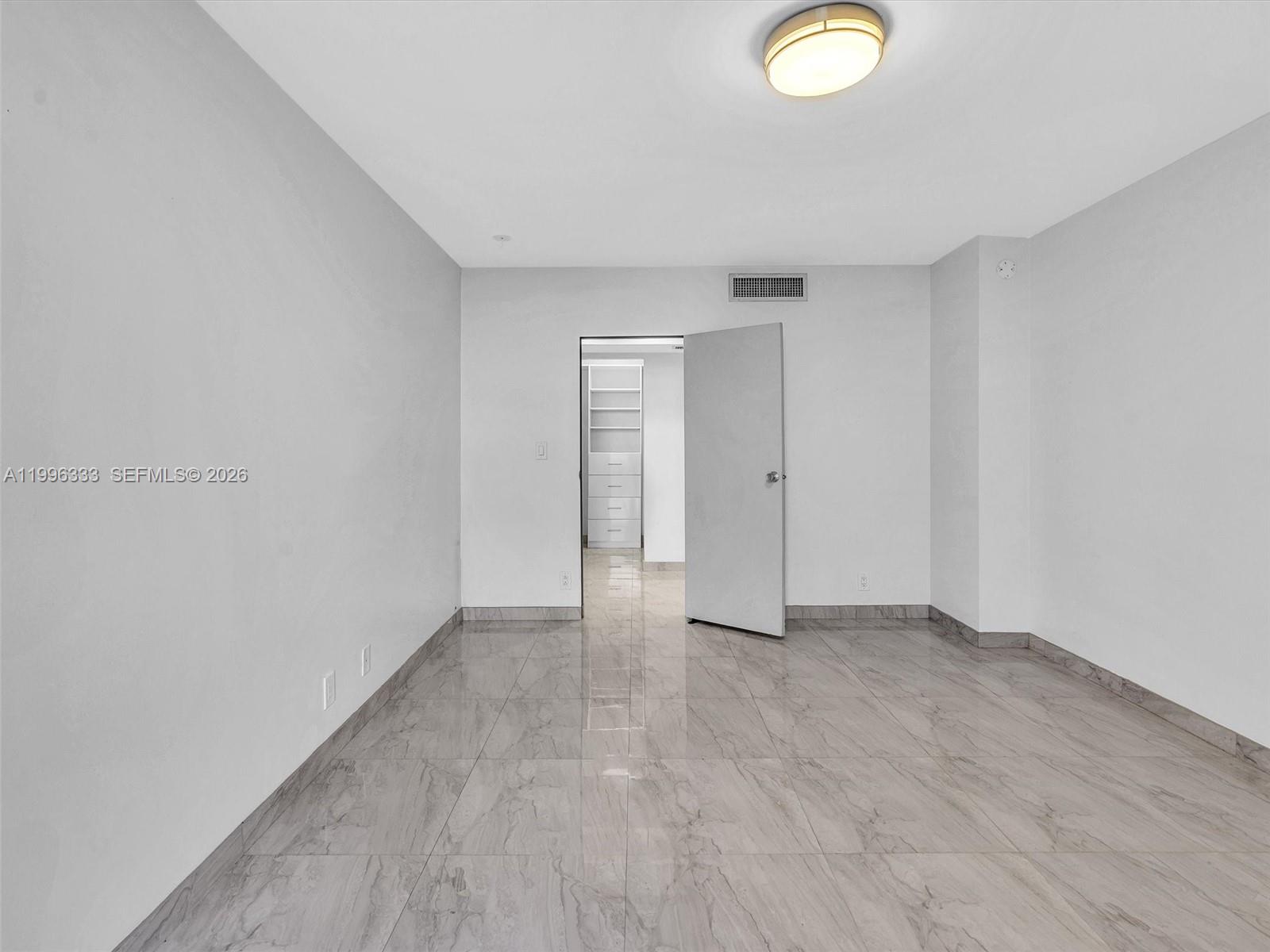 Photo of #521, Aventura, Florida, 33180 - Bedroom with walk-in closet located across