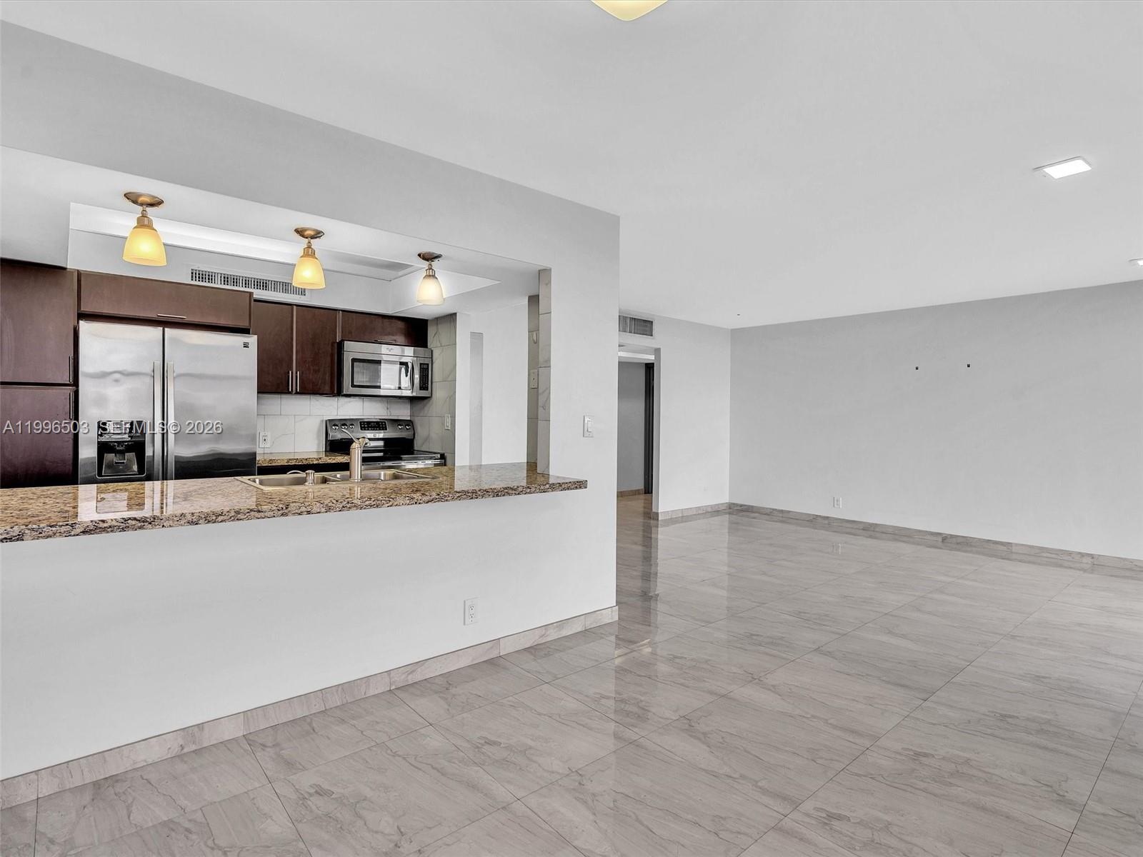 Photo of #521, Aventura, Florida, 33180 - Updated Kitchen with breakfast bar and open layout