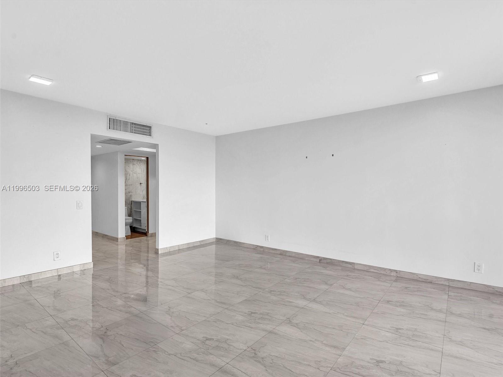 Photo of #521, Aventura, Florida, 33180 - Living room with view toward entry and hallway