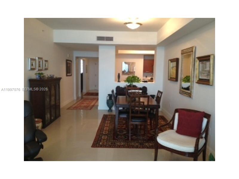 Photo of 3330 190th St  #1615, Aventura, Florida, 33180 - Dining room has pass through to kitchen