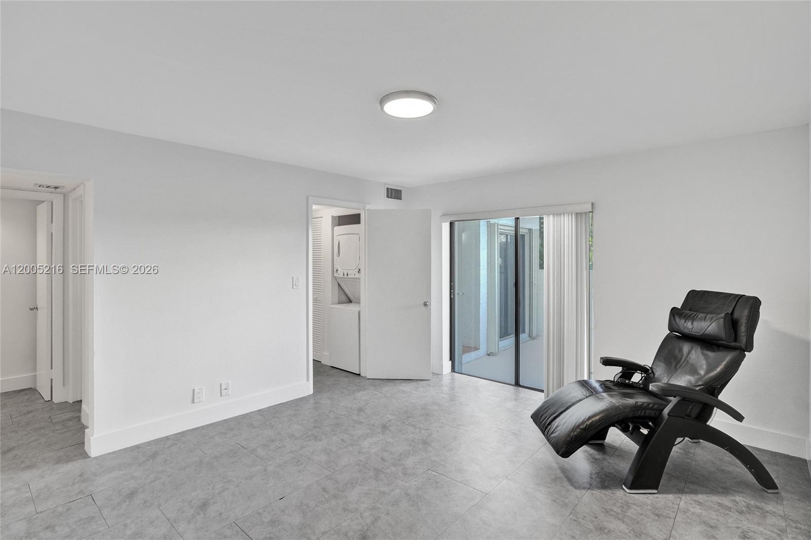 Photo of 20332 34th Ct #26, Aventura, Florida, 33180 - Primary bedroom large enough for an office or relaxing on a chair