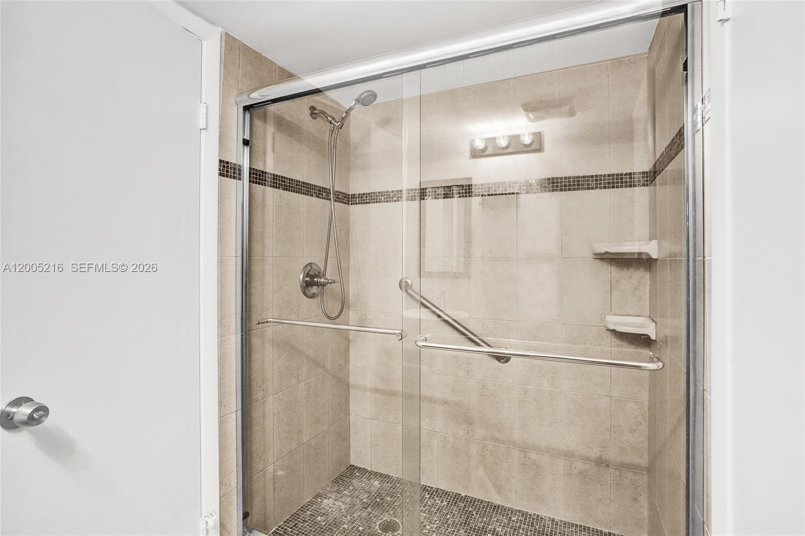 Photo of 20332 34th Ct #26, Aventura, Florida, 33180 - Updated bathroom shower