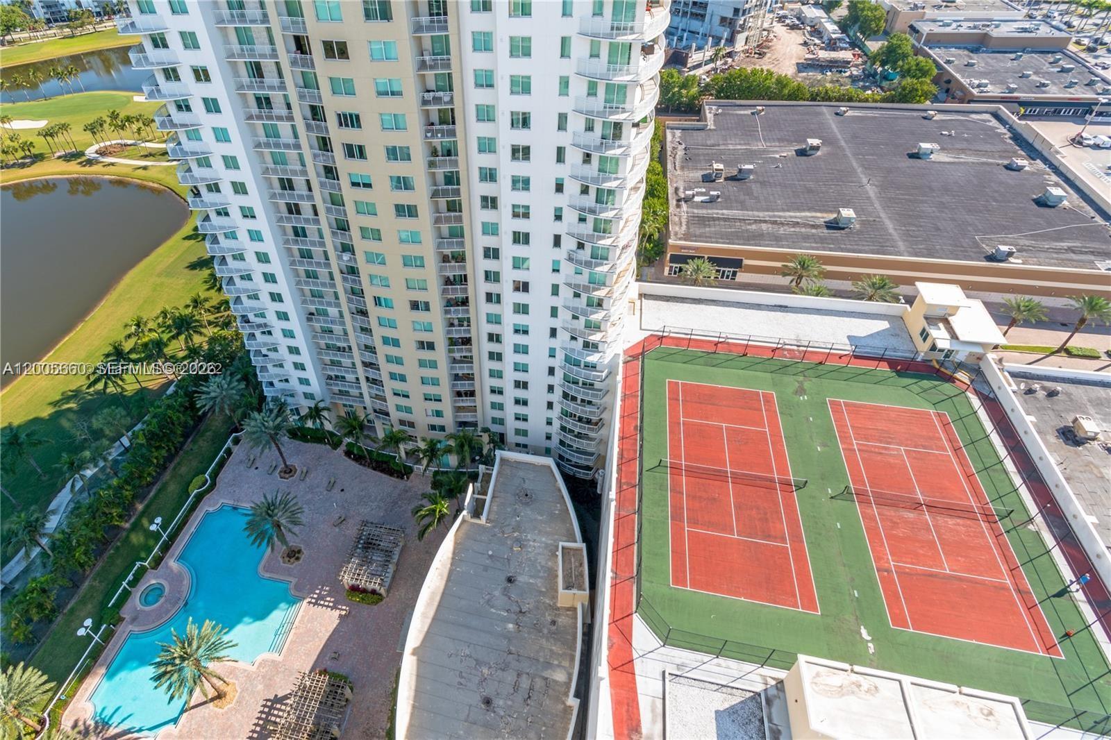 Photo of 1745 Hallandale Beach Blvd  #301W, Hallandale Beach, Florida, 33009 - Exterior Front & Tennis Court