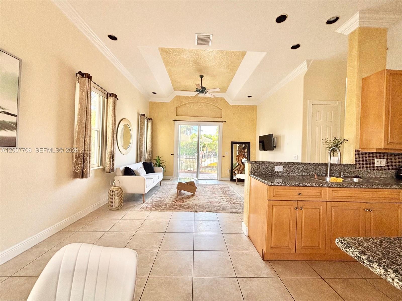 Photo of 1141 Waterside Ln  (1141), Hollywood, Florida, 33019 - Family room off of kitchen area