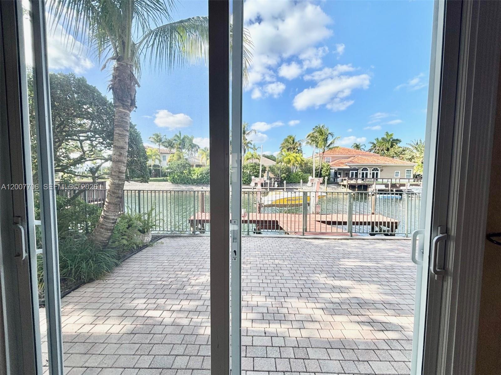 Photo of 1141 Waterside Ln  (1141), Hollywood, Florida, 33019 - Patio access from family room