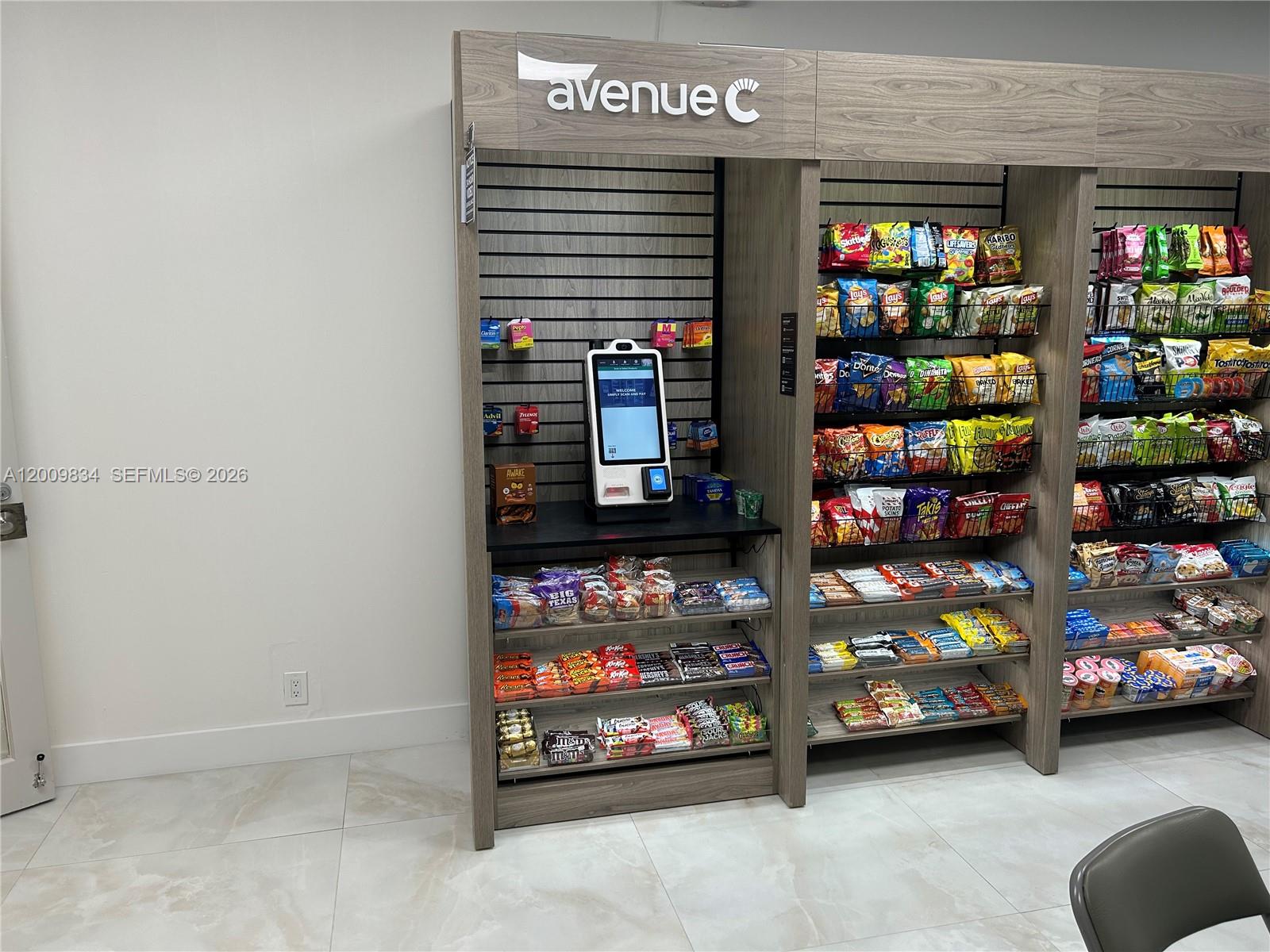 Photo of 3001 Ocean Dr  #101, Hollywood, Florida, 33019 - 24 hour store with coffee snack machines & TV