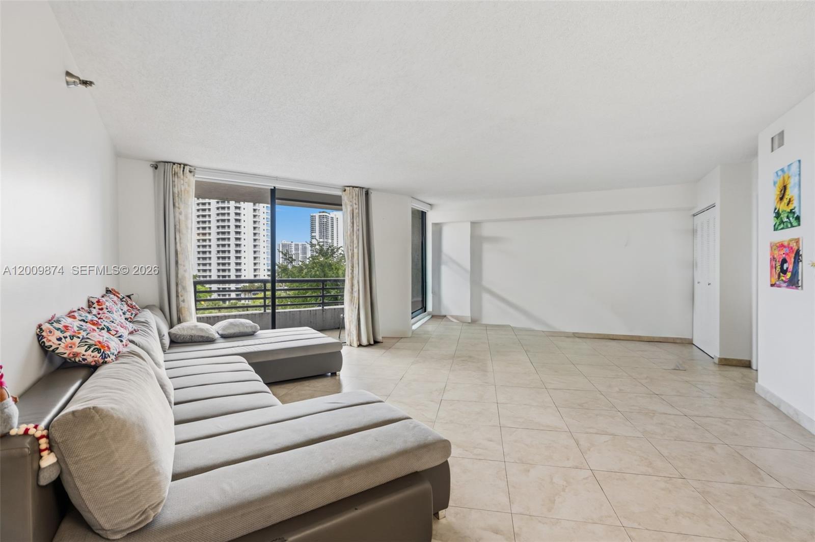Photo of 3300 191st St #609, Aventura, Florida, 33180 - Living room & den/possible second bedroom photoshop