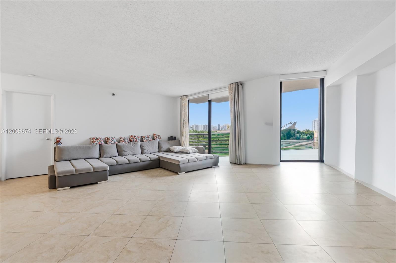 Photo of 3300 191st St #609, Aventura, Florida, 33180 - Living room & den - photoshop