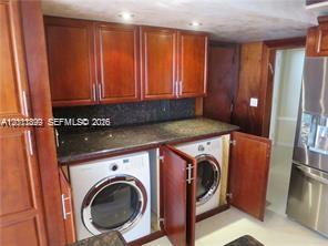 Photo of 1912 Ocean Dr  #3D, Hallandale Beach, Florida, 33009 - Full Washer Dryer, neatly hidden in Custom Cabinetry!