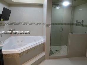 Photo of 1912 Ocean Dr  #3D, Hallandale Beach, Florida, 33009 - Master Bedroom w/En-Suite Bathroom!