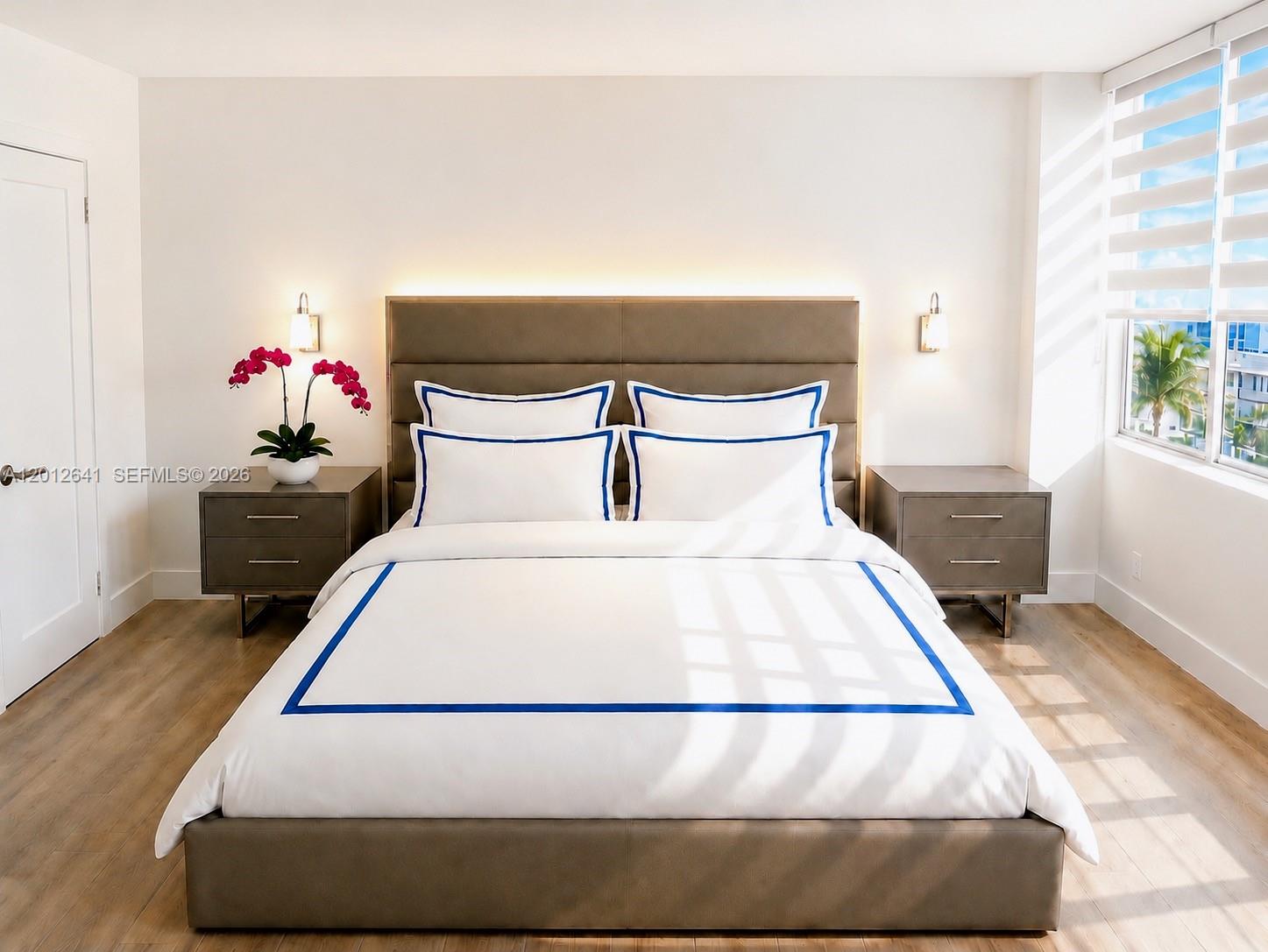 Photo of 2030 Ocean Dr  #309, Hallandale Beach, Florida, 33009 - SPACIOUS BEDROOM SUITE OFFERS SITTING AREA AND TWO WALK-IN CLOSETS