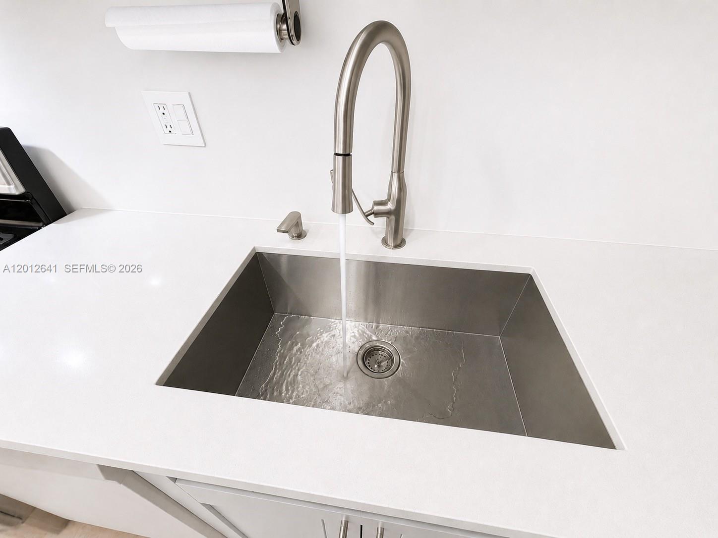 Photo of 2030 Ocean Dr  #309, Hallandale Beach, Florida, 33009 - CUSTOM DESIGNED QUARTZ COUNTER WITH UNDERMOUNTED  STAINLESS STEEL COMMERCIAL  SINK