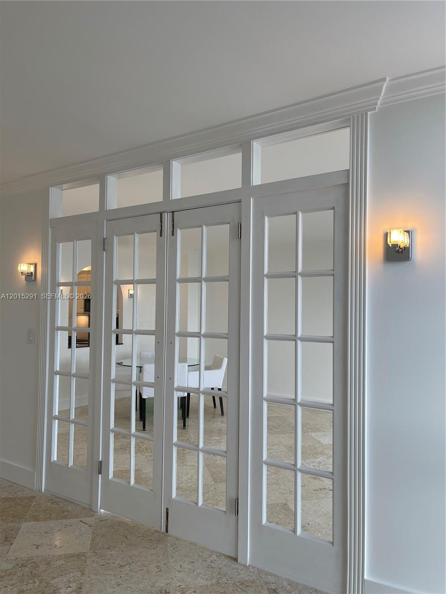 Photo of 3625 Country Club Dr #907, Aventura, Florida, 33180 - Bedroom Looking Out through French Doors