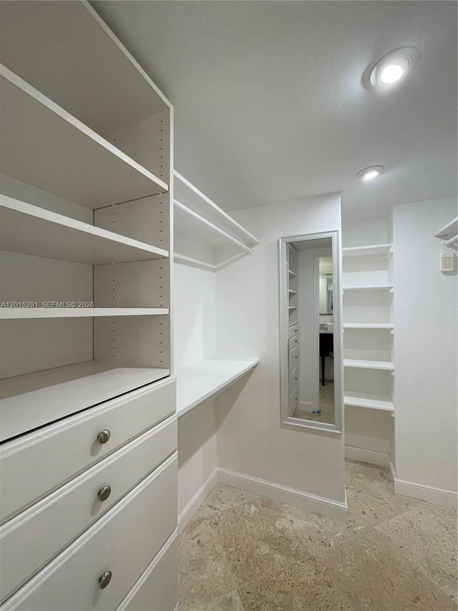 Photo of 3625 Country Club Dr #907, Aventura, Florida, 33180 - Organized Walk-In Closet