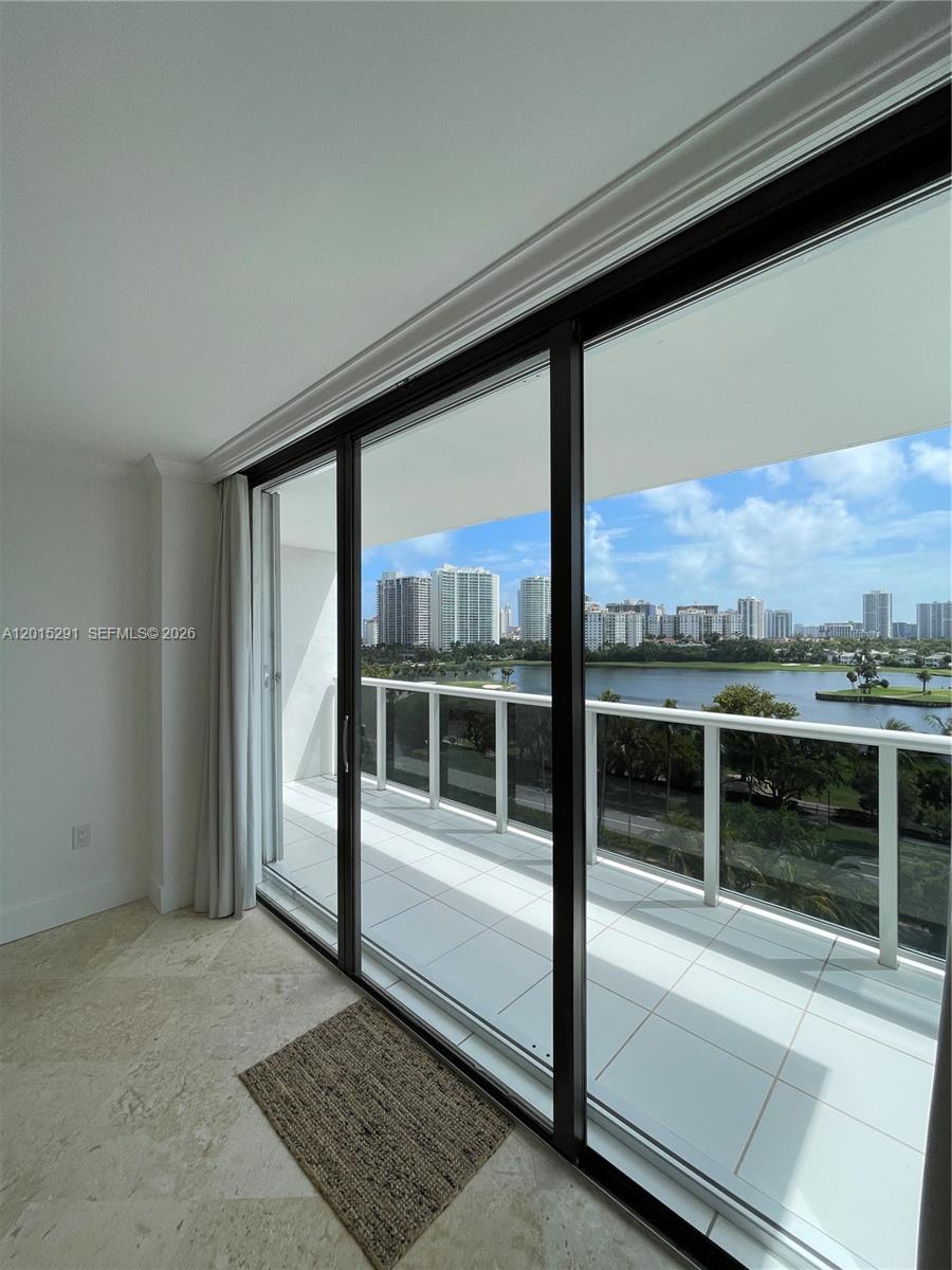Photo of 3625 Country Club Dr #907, Aventura, Florida, 33180 - Sliding Doors to Large Balcony