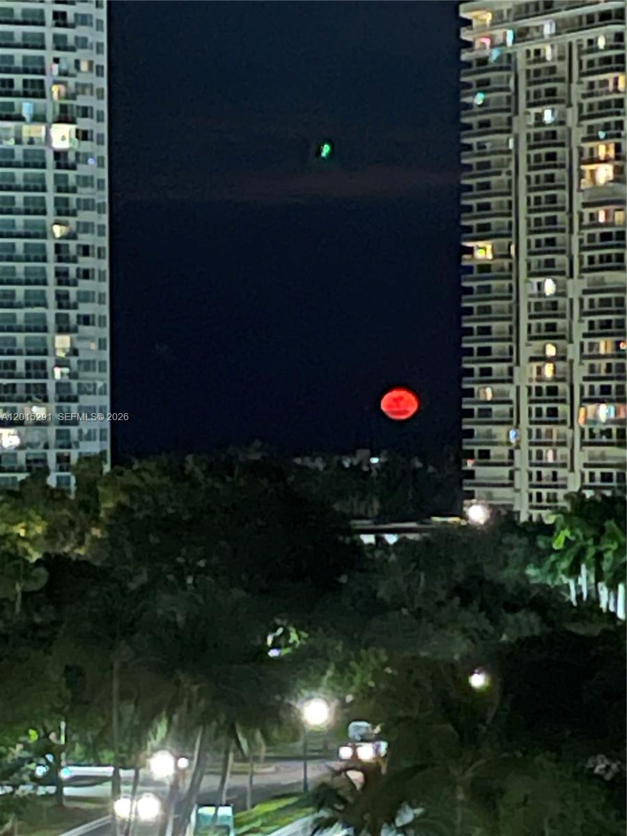 Photo of 3625 Country Club Dr #907, Aventura, Florida, 33180 - Moon coming up over the Ocean