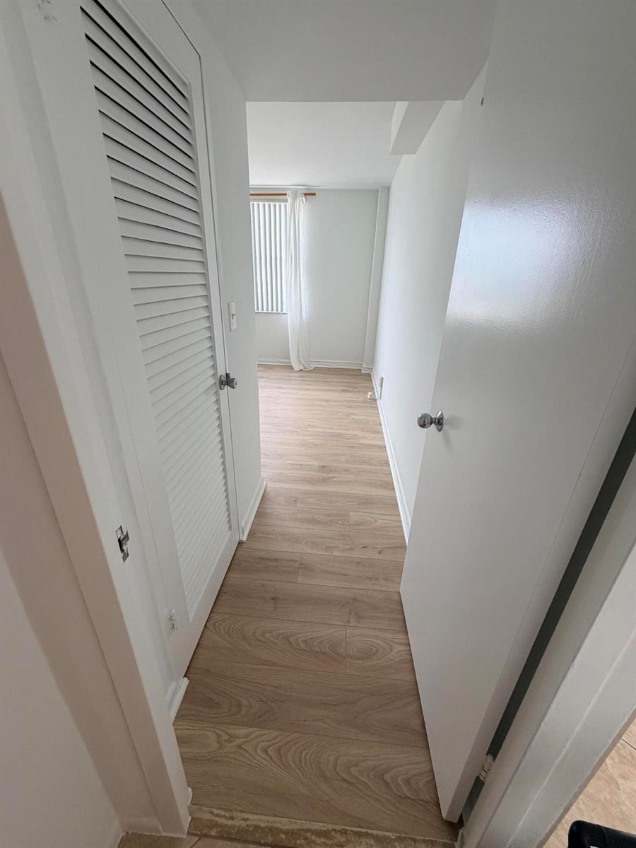 Photo of 9195 Collins #913, Surfside, Florida, 33154 - Hallway to bedroom
