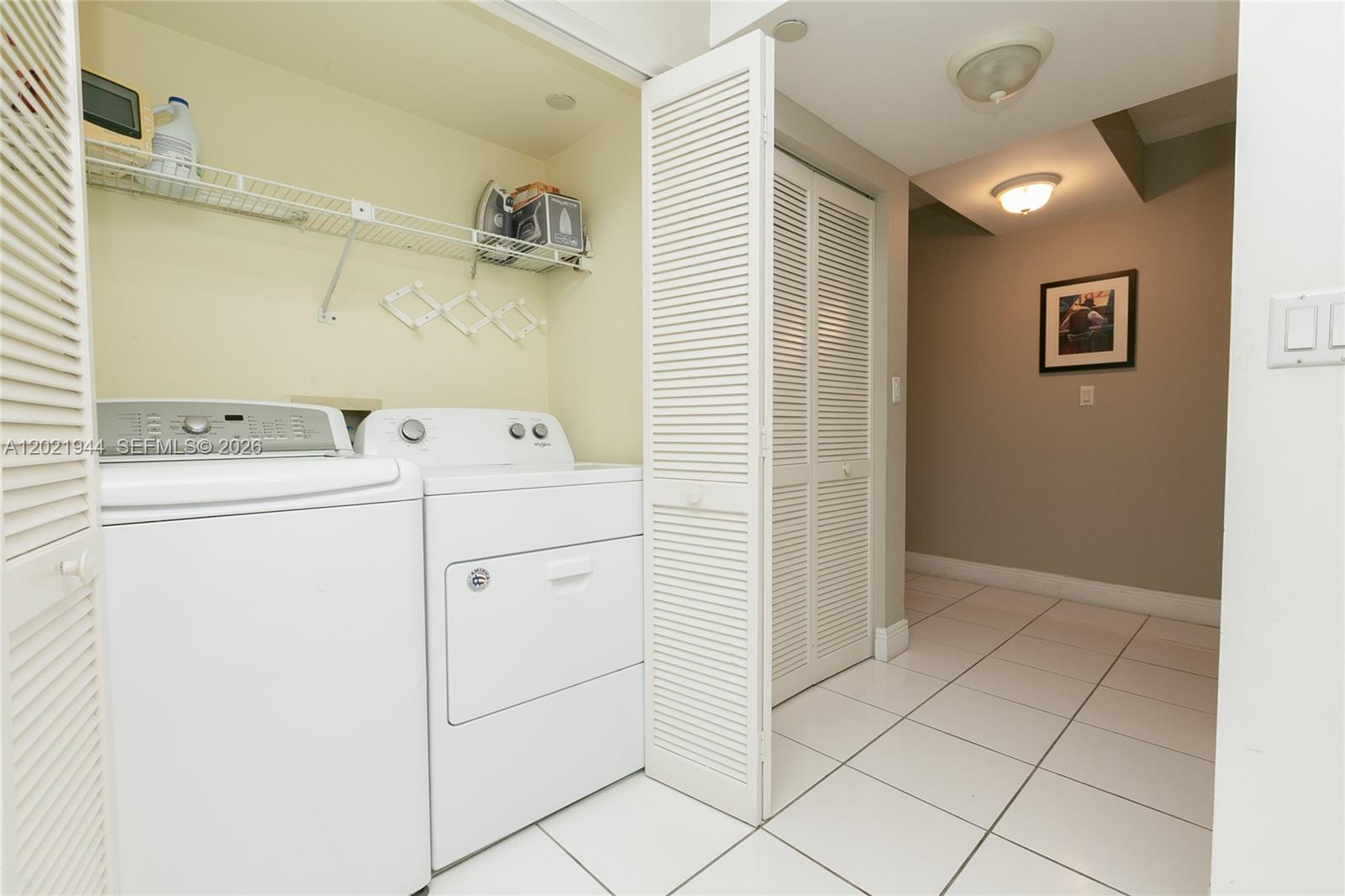 Photo of 8855 Collins Ave  #6F, Surfside, Florida, 33154 - located in the kitchen behind the folding doors