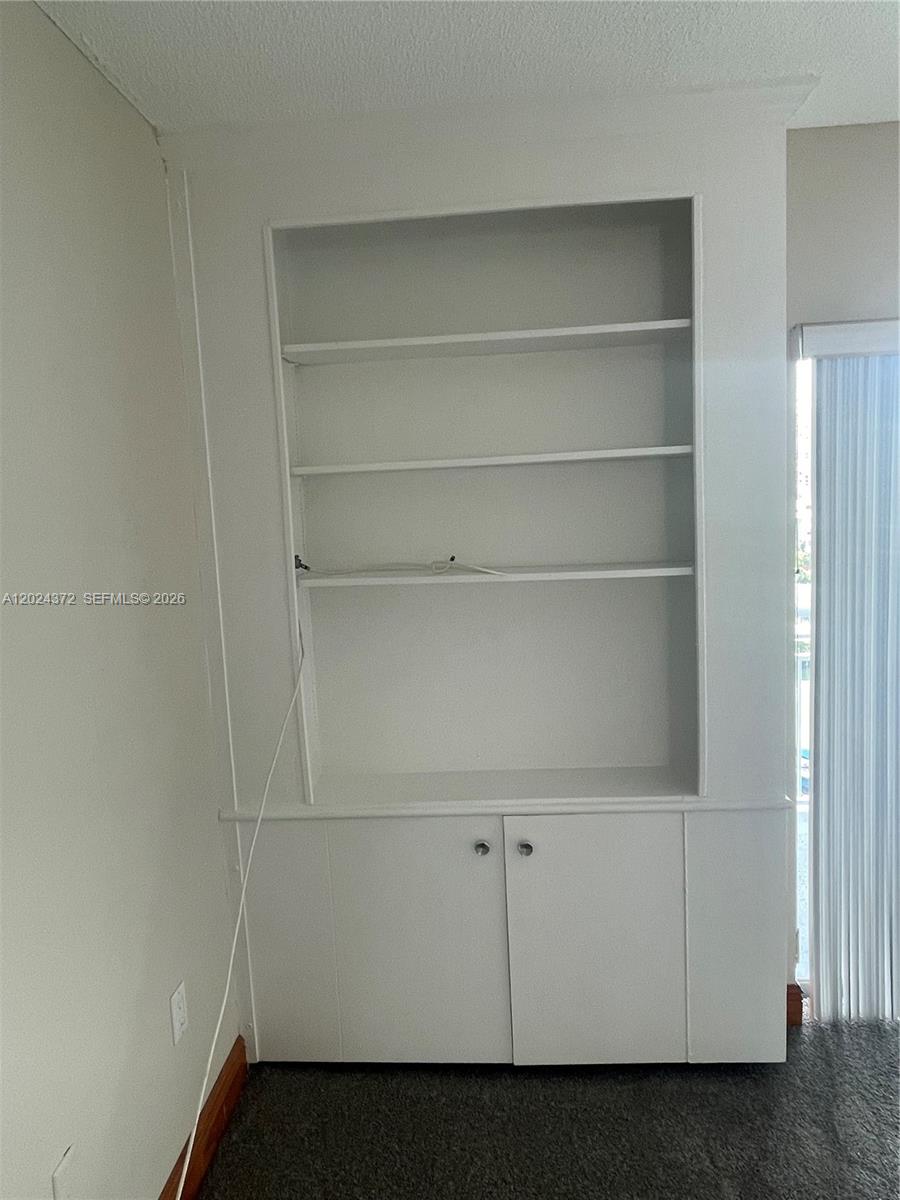 Photo of 400 Kings Point Dr  #829, Sunny Isles Beach, Florida, 33160 - Living Room storage