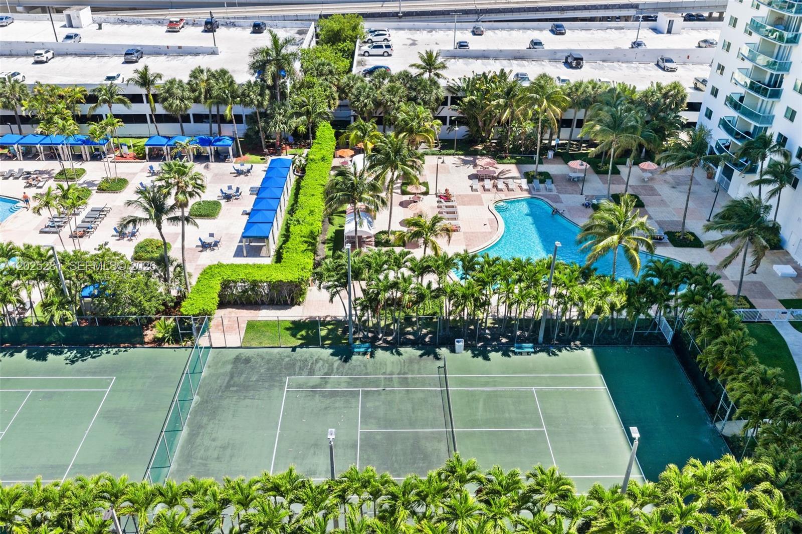 Photo of 19380 Collins Ave  #1122, Sunny Isles Beach, Florida, 33160 - Pool and Tennis Court