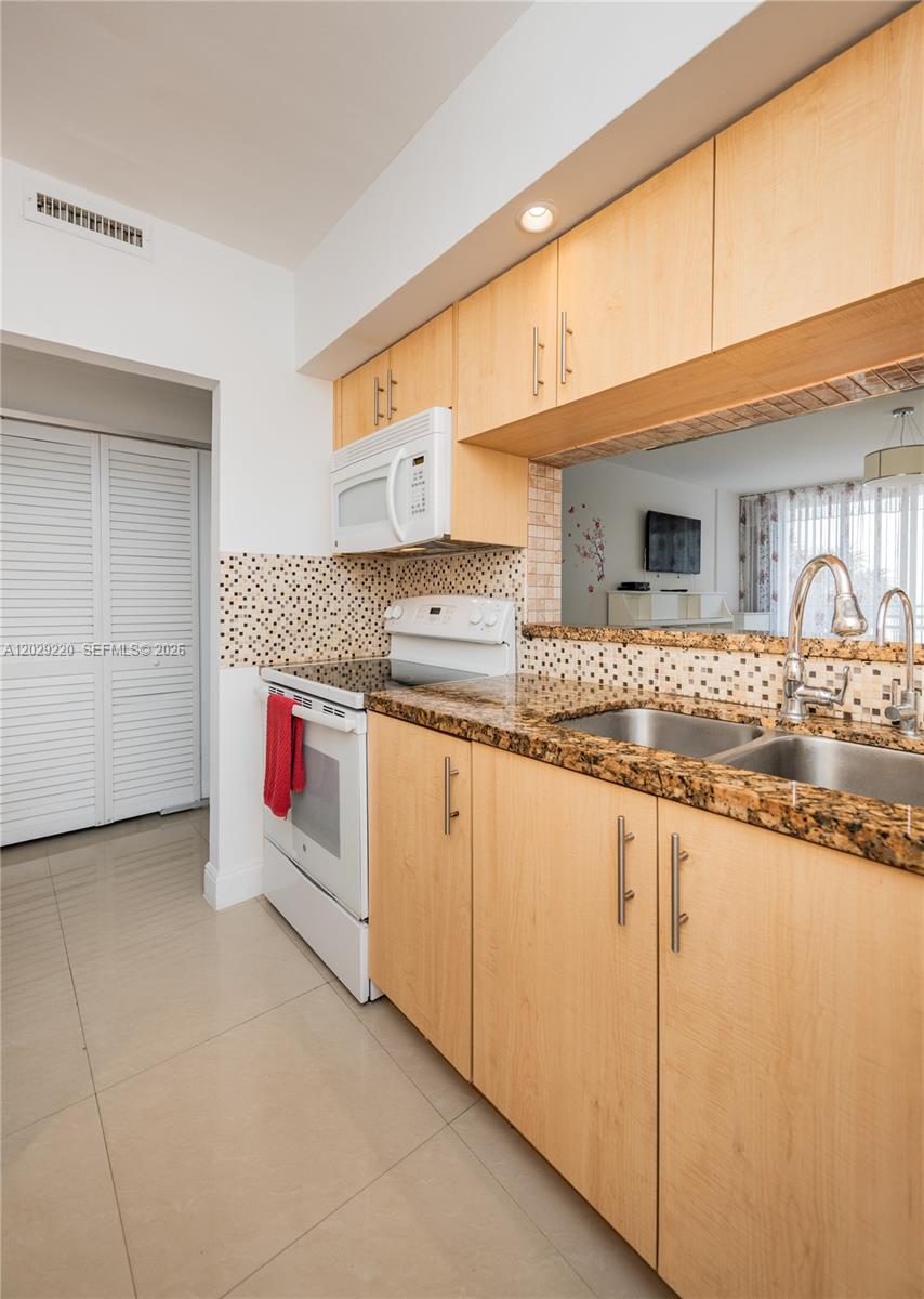Photo of 3505 Ocean Dr  #221, Hollywood, Florida, 33019 - Kitchen/w installed Water Filter