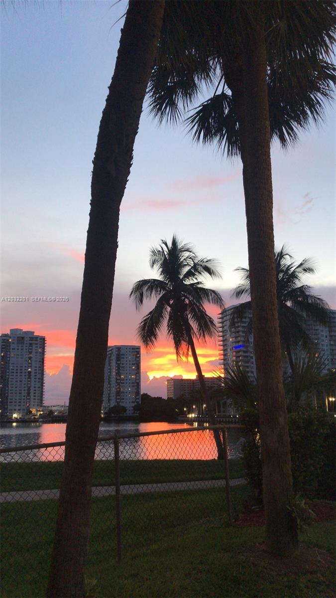 Photo of 18181 31st Ct  #1710, Aventura, Florida, 33160 - Lake at sunset from pool