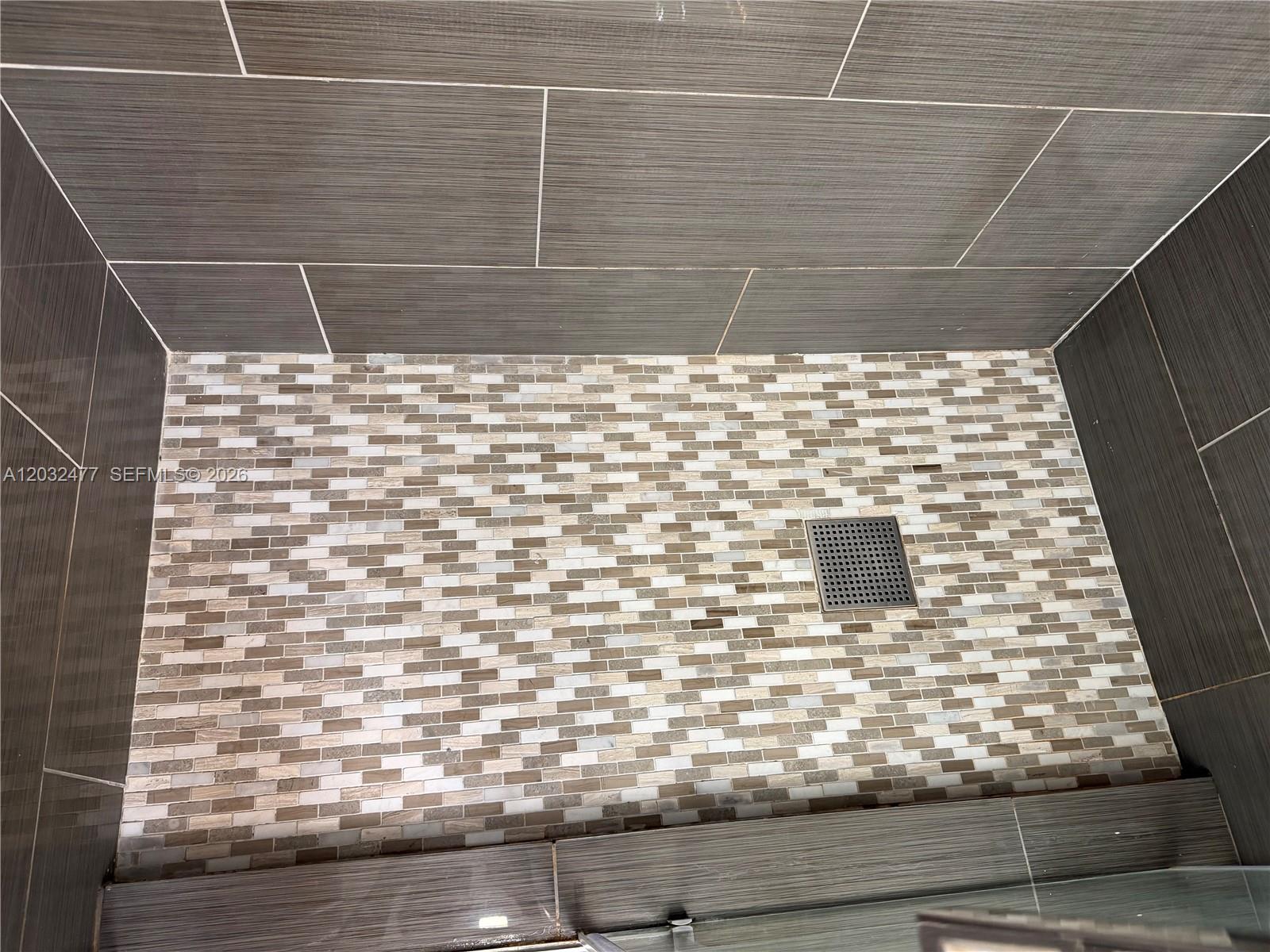 Photo of 3300 192nd St #1109, Aventura, Florida, 33180 - Shower floor tiles