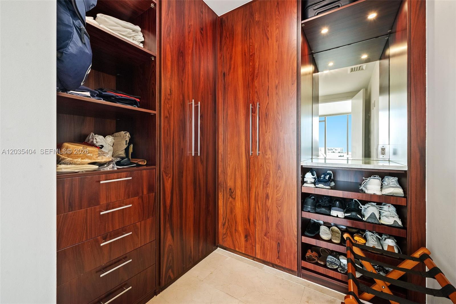 Photo of 9705 Collins Ave #605N, Bal Harbour, Florida, 33154 - Primary walk-in closet