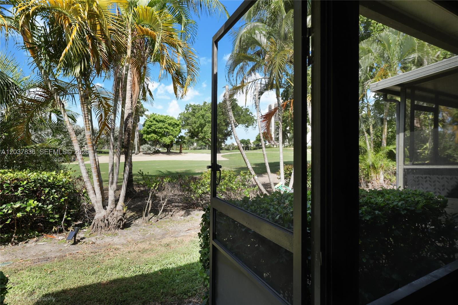 Photo of 20308 34th Ct  (20308), Aventura, Florida, 33180 - Going out from the patio