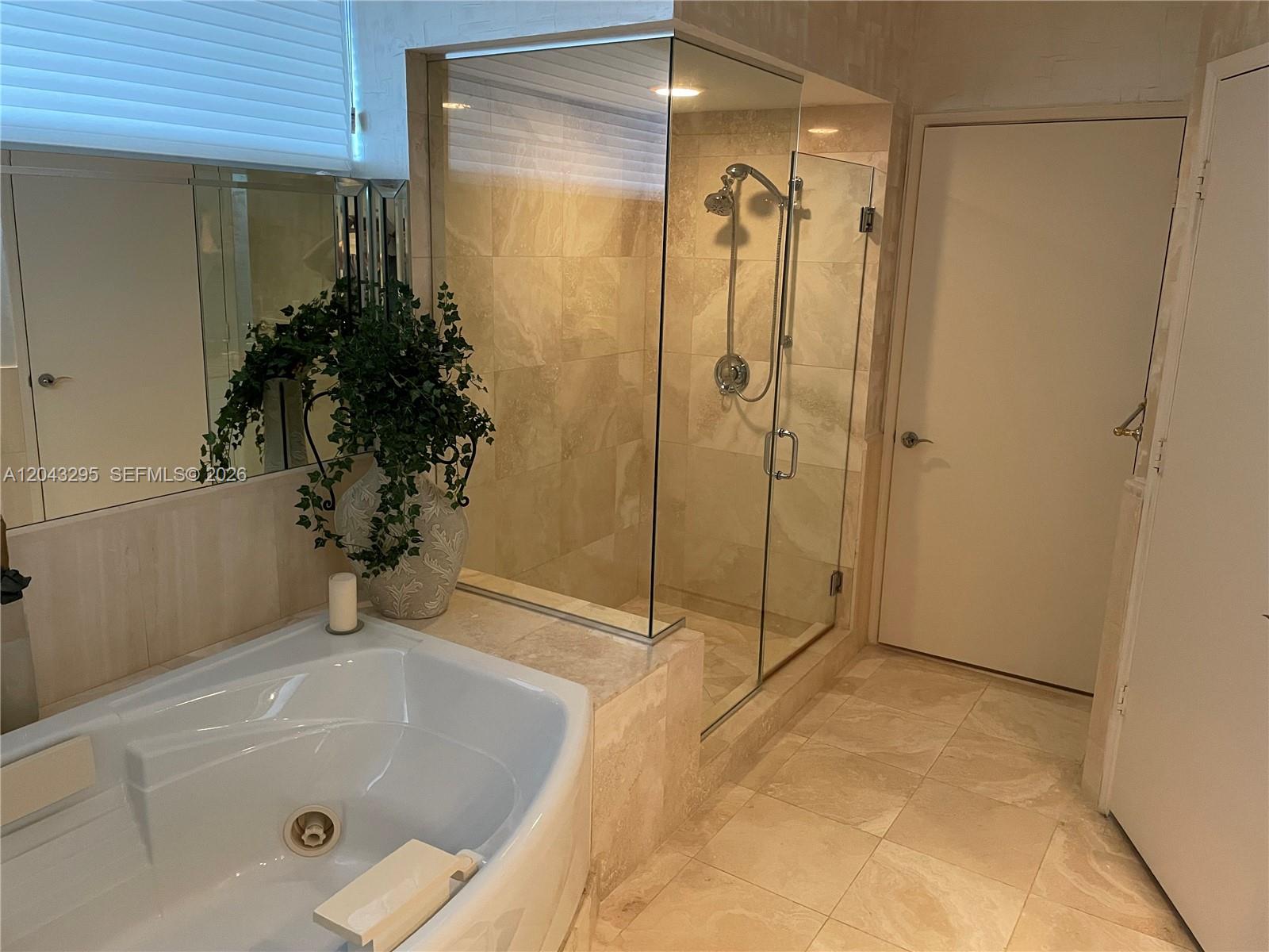 Photo of 17555 Collins Ave #1906, Sunny Isles Beach, Florida, 33160 - Primary Bathroom Jacuzzi Tub