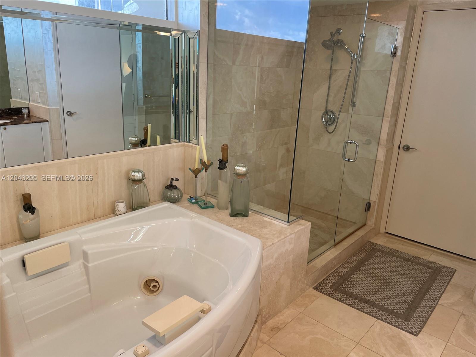 Photo of 17555 Collins Ave #1906, Sunny Isles Beach, Florida, 33160 - Primary Bathroom Tub & Shower