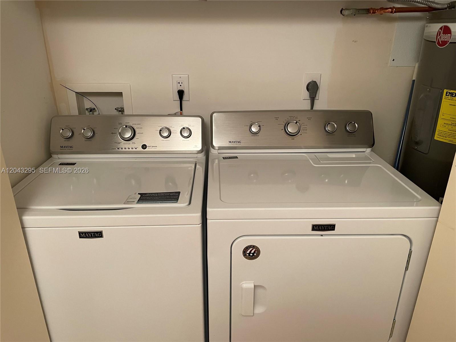 Photo of 17555 Collins Ave #1906, Sunny Isles Beach, Florida, 33160 - Full-sized washer and dryer in unit.