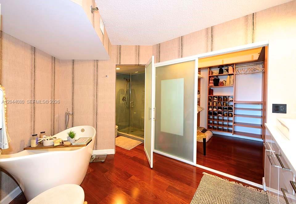 Photo of 3600 Mystic Pointe Dr  #718, Aventura, Florida, 33180 - Master Bathroom, w/ enclosed toilet
