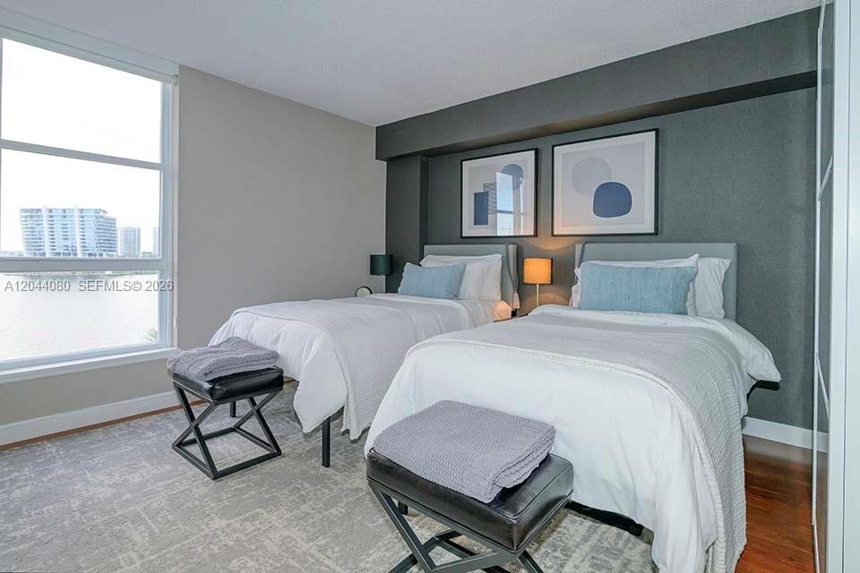 Photo of 3600 Mystic Pointe Dr  #718, Aventura, Florida, 33180 - Bedroom #2 with water views