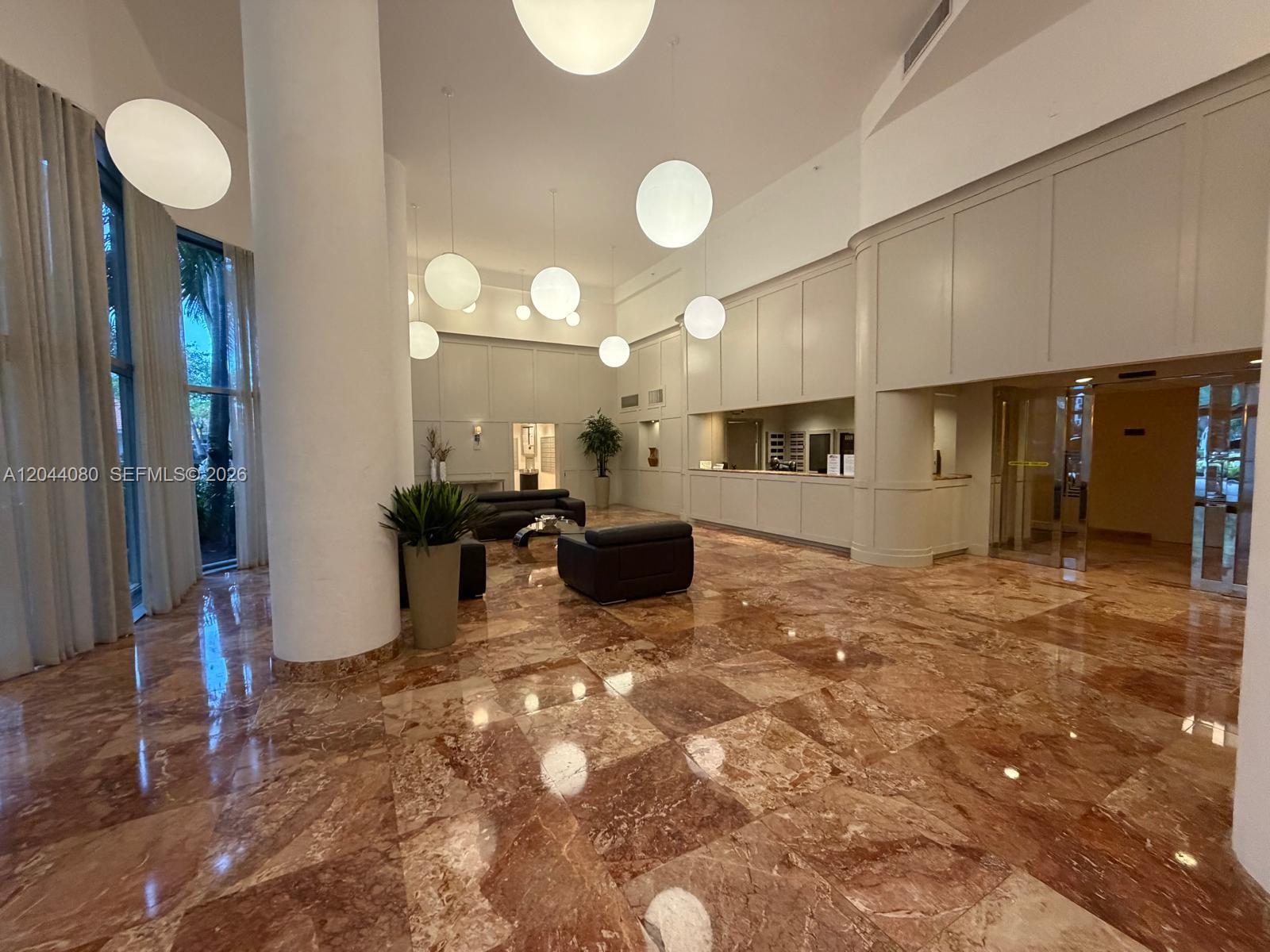 Photo of 3600 Mystic Pointe Dr  #718, Aventura, Florida, 33180 - Lobby attended