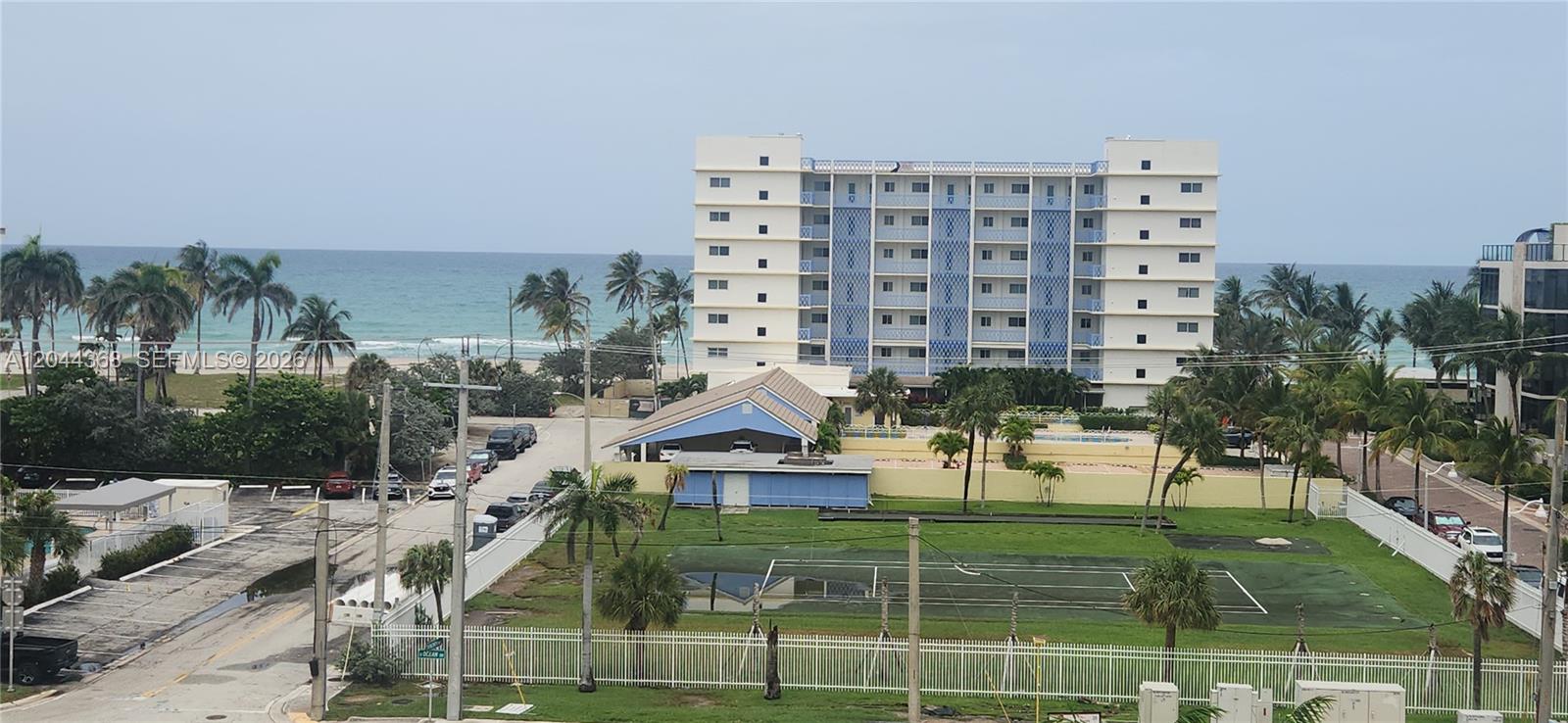Photo of 1600 Ocean Dr  #12F, Hollywood, Florida, 33019 - walk across ocean drive to beach and broad walk can begin too