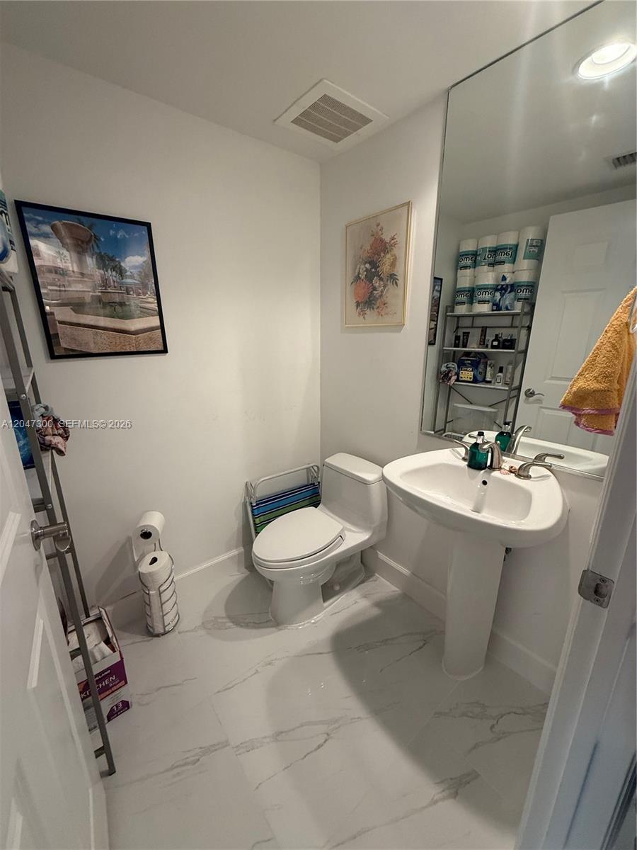 Photo of 1745 Hallandale Beach Blvd #304W, Hallandale Beach, Florida, 33009 - Guest 1/2 Bath