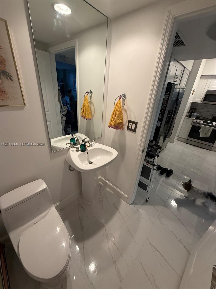 Photo of 1745 Hallandale Beach Blvd #304W, Hallandale Beach, Florida, 33009 - Guest 1/2 Bath