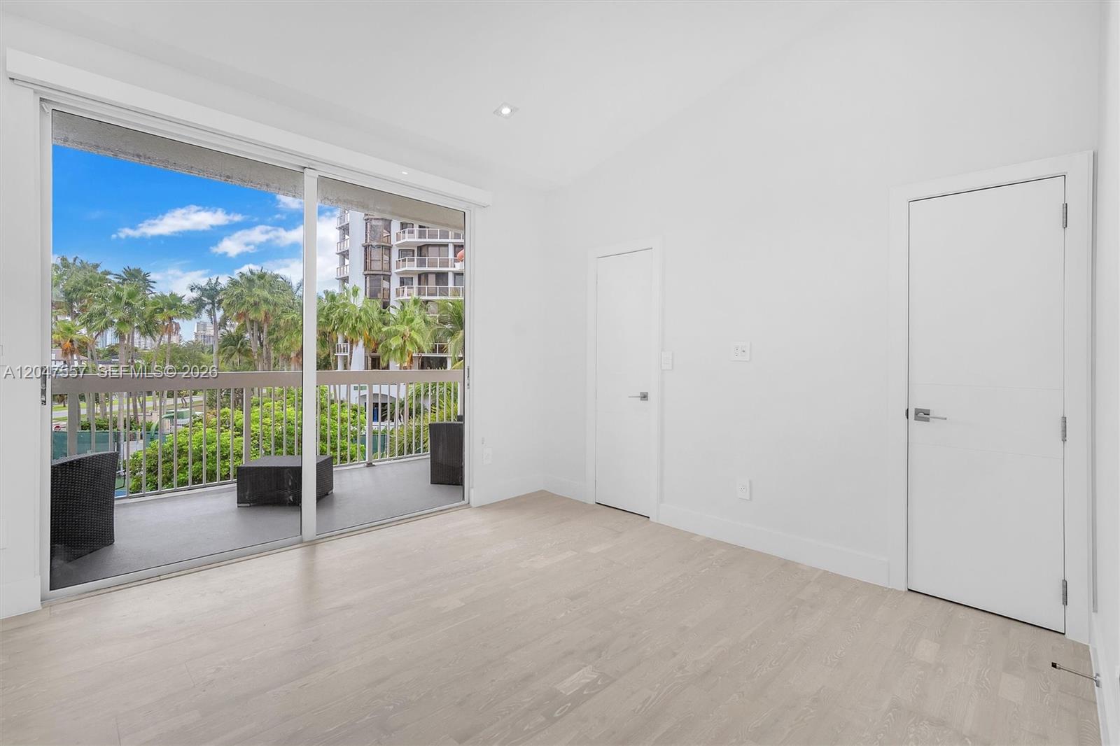 Photo of 21391 Marina Cove Cir (21391), Aventura, Florida, 33180 - Third bedroom with oversized balcony and view to canal