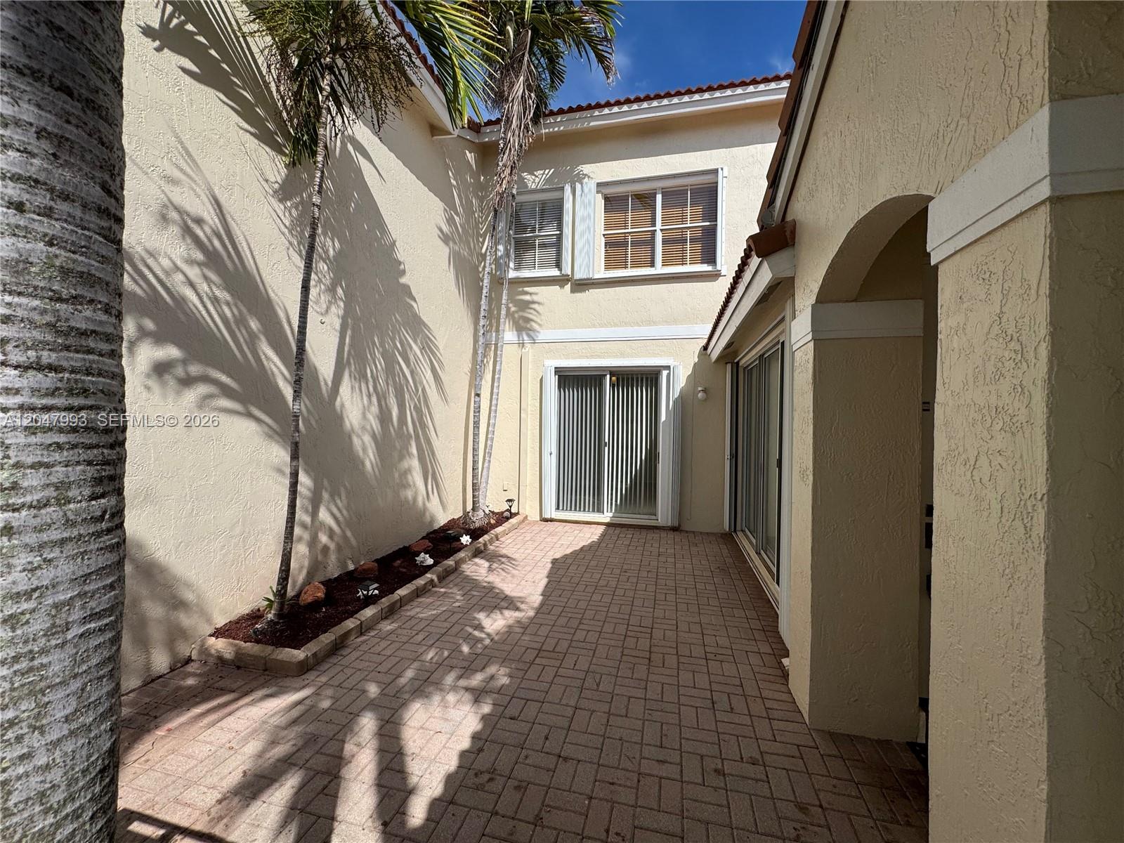 Photo of 1595 Seagrape Way (1595), Hollywood, Florida, 33019 - Entry through Private Courtyard