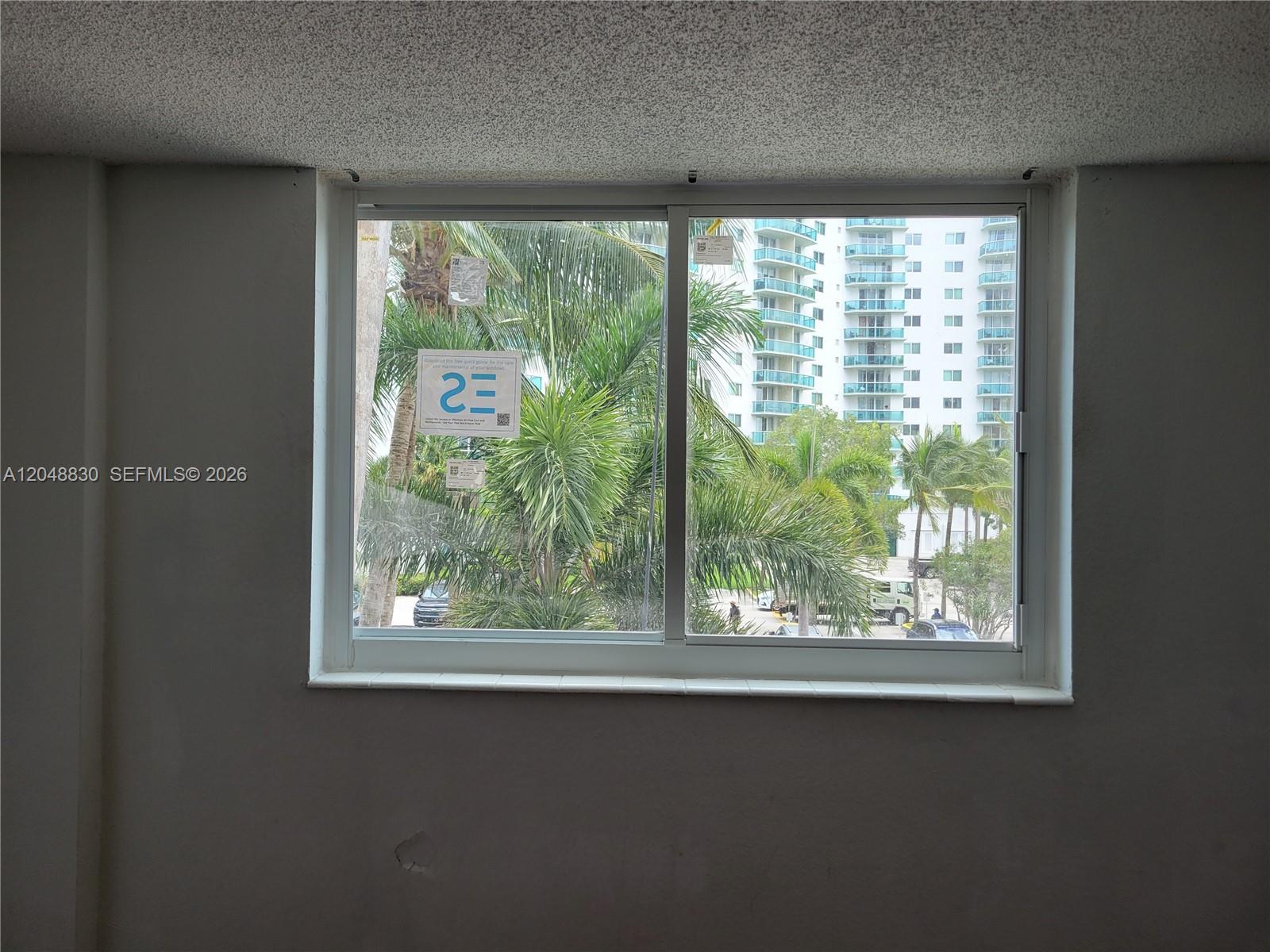 Photo of 19390 Collins Ave  #220, Sunny Isles Beach, Florida, 33160 - Bedroom 1 New Hurricane High Impact Window.