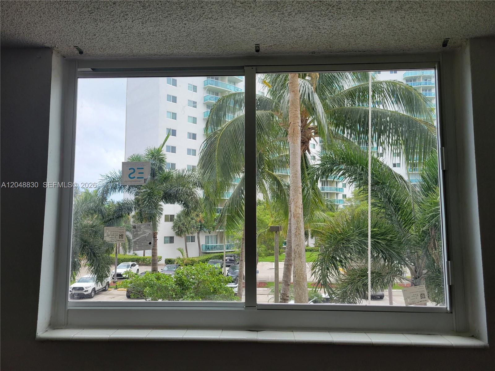 Photo of 19390 Collins Ave  #220, Sunny Isles Beach, Florida, 33160 - Bedroom 2 New Hurricane High Impact Window.
