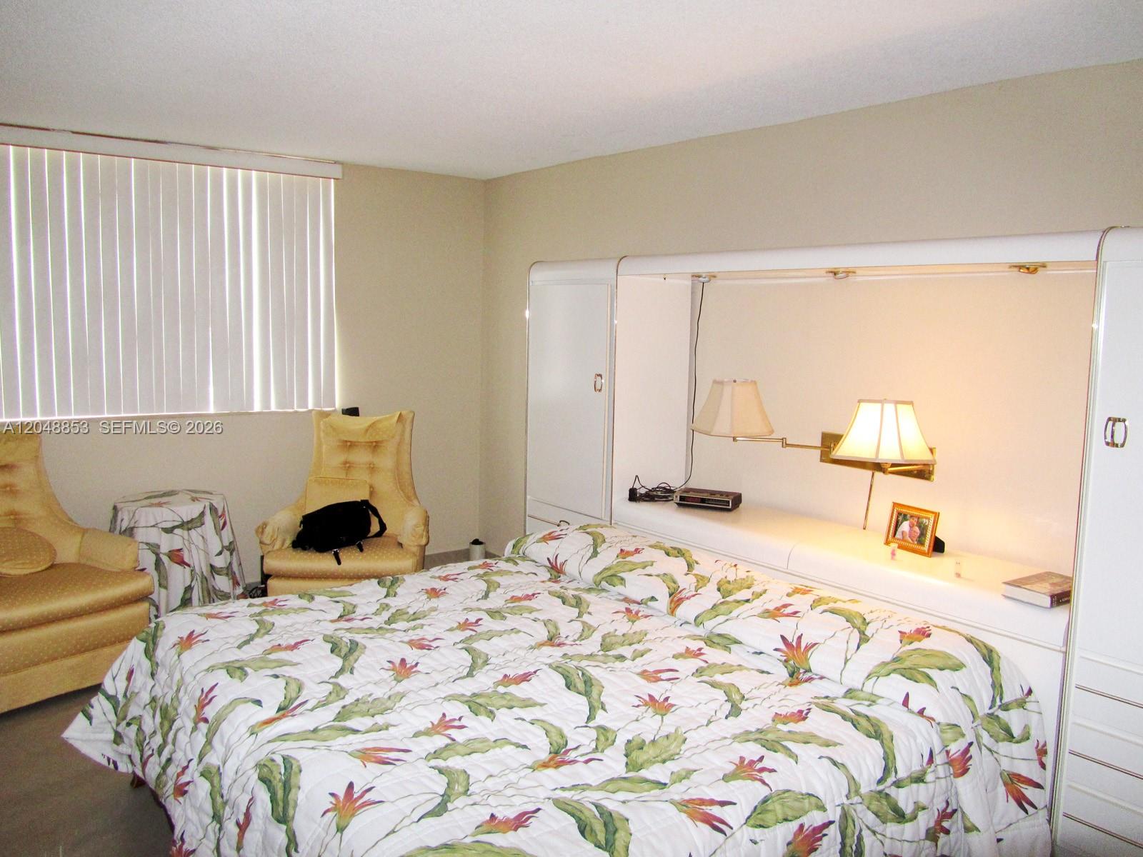 Photo of 1833 Ocean Dr  #911, Hallandale Beach, Florida, 33009 - comfortable master bedroom with private bath and walkin closet