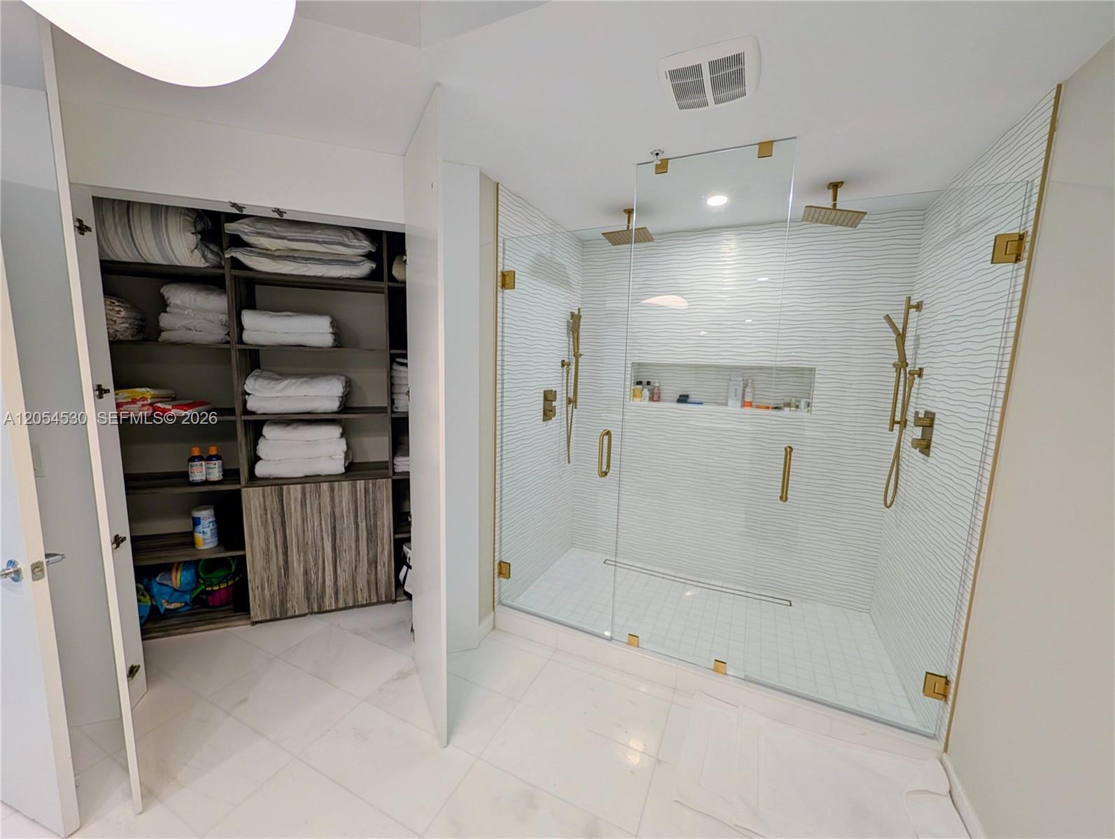 Photo of 17301 Biscayne Blvd #1501, North Miami Beach, Florida, 33160 - Master bathroom shower and added closet