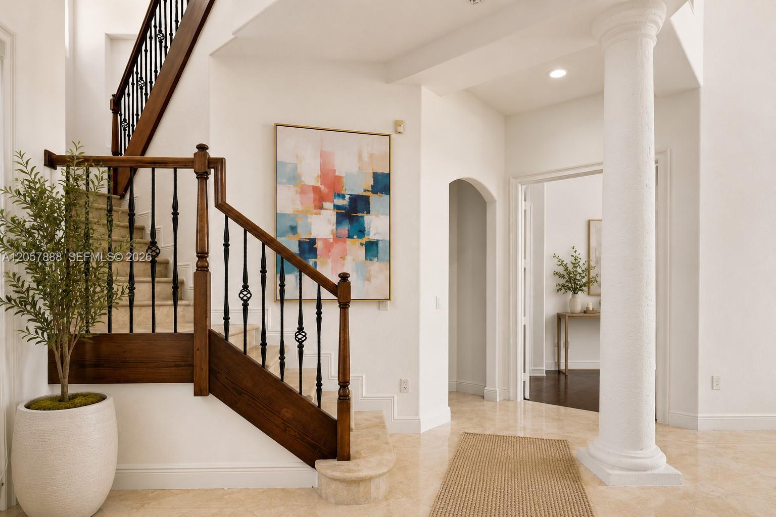 Photo of 996 Sanibel Dr (996), Hollywood, Florida, 33019 - GRAND FOYER WITH A STAIRWAY TO NEW MEMORIES!