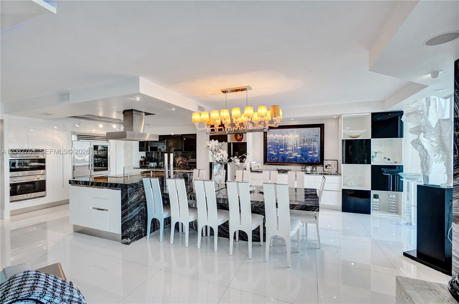 Photo of 3201 183rd St  #2403, Aventura, Florida, 33160 - Marble dinning table for 12.