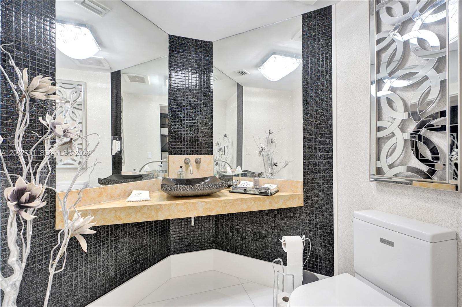 Photo of 3201 183rd St  #2403, Aventura, Florida, 33160 - Guest bathroom.